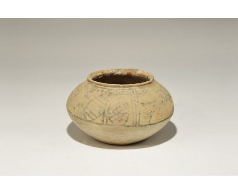 3300-1700 BC. A squat terracotta jar with everted rim, polychrome band to the shoulder with fish, peepal leaf and geometric p