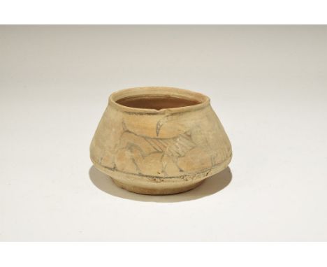 3300-1700 BC. A squat biconical terracotta jar with flared rim; polychrome frieze of advancing ibexes and geometric panels. 4