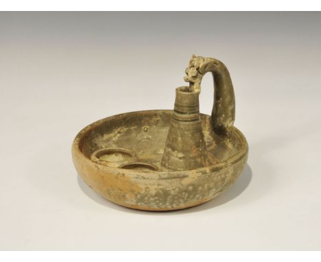 An undated archaistic green-glazed ceramic bowl with hollow conical fitting and dragon-shaped handle, two small bowls within.
