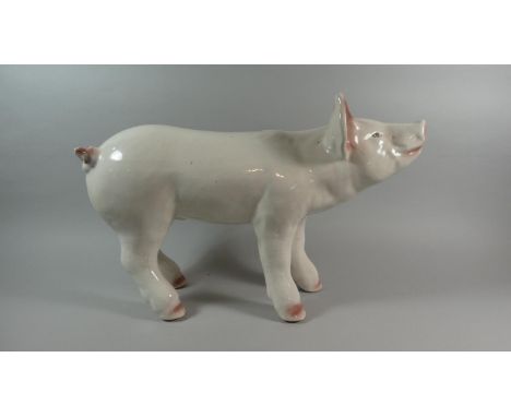 A Large Ceramic Study of a Pig, 55cm Long 
