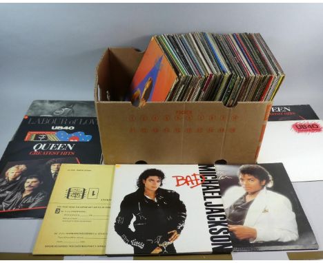 A Collection of 100 LP Records to Include The Who, UB40, Queen, Michael Jackson etc 