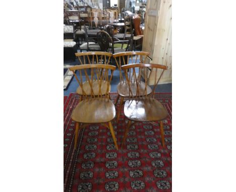 A Set of Four Ercol Candlestick Dining Chairs 