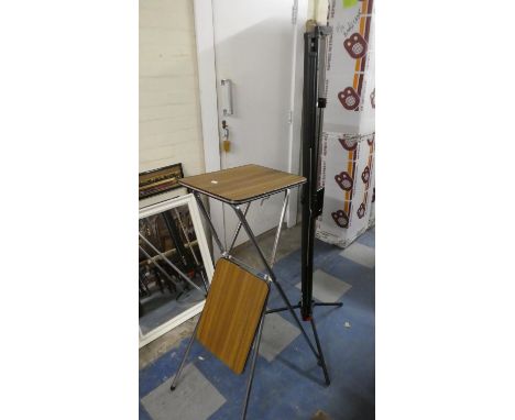 A Projector Stand and Tripod Screen 