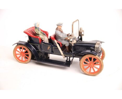 Carette Automobil offene 4-sitzige Limousine ca. 1909, Uhrwerk intakt und in seltener dunkelblauer handbemalter Farbe , Gummi