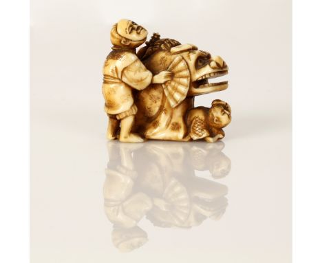 the netsuke is finely carved and engraved. partially blackened. signed 3.5*4.5cm small chip to foot of the netsuke