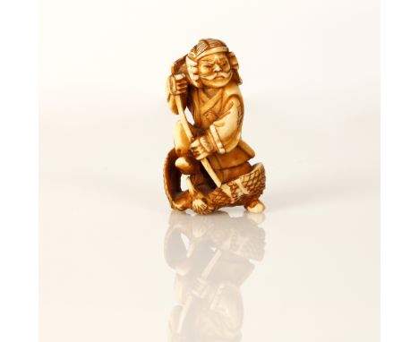 The netsuke is Finely carved and partially blackened. fine detailing throughout. signed on the foot. 6cm*3.5cm some imperfect