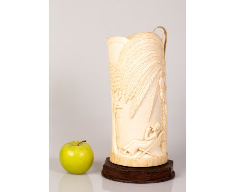 African Bone Tusk depicting Village People's Life on a wooden stand, converted to a night lamp.  Signed on base.  Height incl