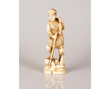 Old Japanese OKIMONO Marine Bone Sculpture in the figure of a Fisherman Standing on a Mountainside.  Impressive high quality 
