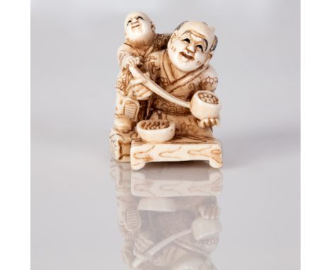 Old Bone Netsuke in the figure of a Father with His Son Dining.  Item illustrated by hand and signed.  Dimensions: 3X3X2 cm.