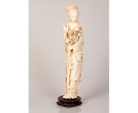 Impressive large old Chinese bone sculpture of an adolescent girl holding a bouquet of flowers on a matching wooden stand, ea