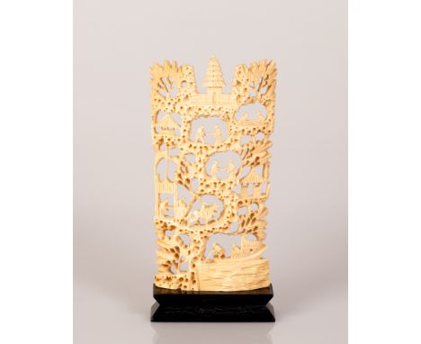 Old Chinese Bone Tusk with openwork, scene of Village Life Routine.  The item is on a wooden stand.  Dimensions: 16X8X2 cm.