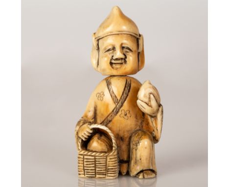 Old Japanese Bone Statuette in the figure of a Boy Wearing a Hat and Holding a Fruit Basket in His Hands.  Signed, item in go