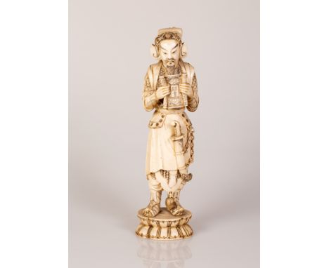 Large high quality Chinese bone sculpture hand carved by an artisan in the figure of a warrior with a sword holding a scroll 
