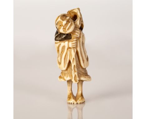 Old Japanese bone netsuke in the figure of an old man carrying a sack on his back.  Very impressive.  Height: 6 cm.
