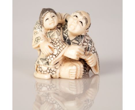 Old Bone Netsuke in the figure of a Child Holding His Father from the Back.   Item illustrated by hand and signed.    Dimensi