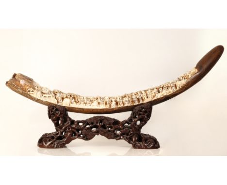 Large impressive Mammoth bone tusk depicting village activity in a Chinese village, impressive fine artisanal craftsmanship. 