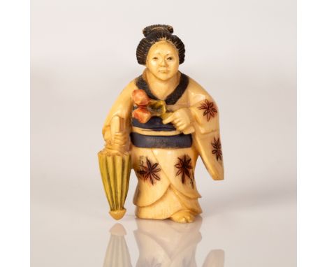 Old Bone Netsuke in the figure of an Adolescent Girl Holding a Colorful Umbrella and Flower Bouquet.   Item illustrated by ha