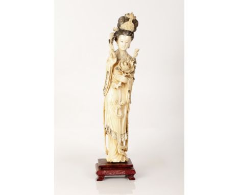Large Sized Bone Sculpture depicting a Chinese woman holding a bundle of flowers in her one hand, the garment wrinkles depict