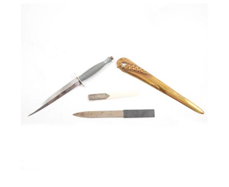 Military dagger, French gilt bronze Art Nouveau paper slicer, signed H Roschmann, a Heidelberg dagger, and an ivory paper sli
