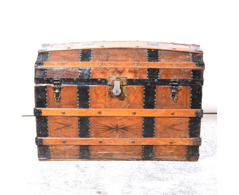 Vintage leather and metal strapped dome-topped trunk, with wooden slats, width 89cm.