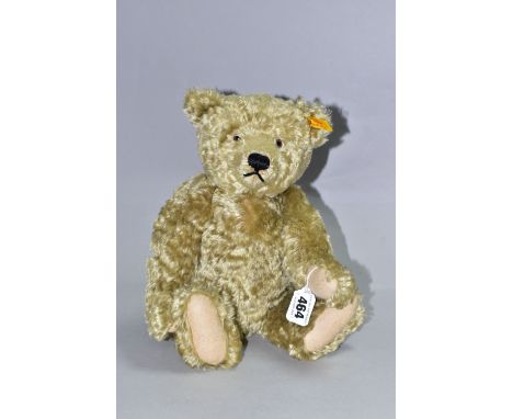 A MODERN STEIFF BLONDE PLUSH MOHAIR TEDDY BEAR, No.654466, button and yellow tag to left ear, missing swing tag, paperwork an