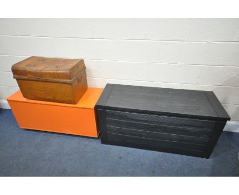 A BLACK PLASTIC GARDEN STORAGE BOX, 118cm x depth 45cm x height 57cm, a vintage tin trunk, and an orange painted chest (3)