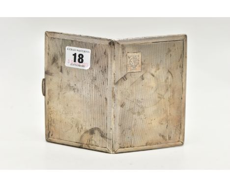 A SILVER CIGARETTE CASE, of a rectangular form, engine turned design with an engraved cartouche, opens to reveal a gilt inter