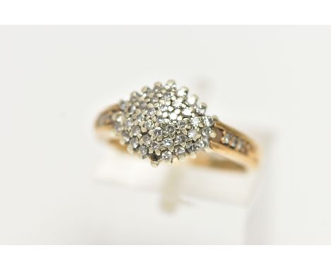 A 9CT GOLD DIAMOND CLUSTER RING, of a marquise form set with single cut diamonds, single cut diamond set shoulders, polished 