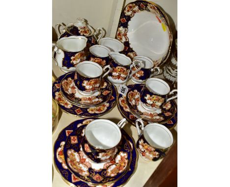 A TWENTY THREE PIECE ROYAL ALBERT 'HEIRLOOM' PATTERN TEA SET, comprising six cups (two have small unglazed patches to exterio