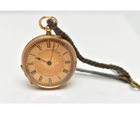 A YELLOW METAL OPEN FACE POCKET WATCH, key wound pocket watch, round gold floral detailed dial, Roman numerals, within a flor