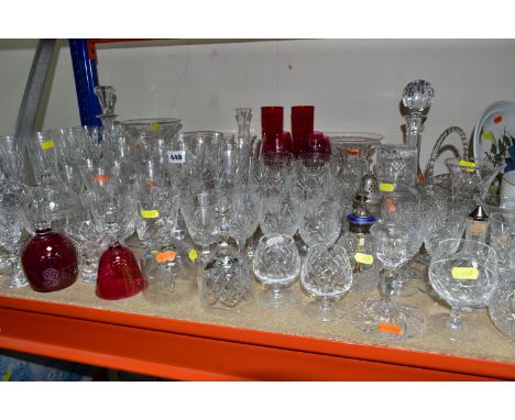 A LARGE QUANTITY OF CUT CRYSTAL AND CRANBERRY GLASSWARE, comprising a silver topped perfume dispenser with a sky blue enamel 