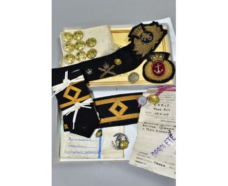 AN INTERESTING BOX OF NAVAL BULLION BADGES, to include shoulder epaulettes and insurance trade blazer buttons, the bullion ba