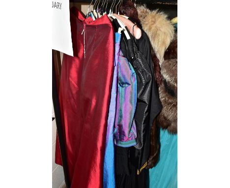 A COLLECTION OF LADIES VINTAGE CLOTHING, comprising three fur stoles, a brown fur jacket (small tear), two black satin evenin