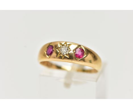 AN EARLY 20TH CENTURY 18CT GOLD, RUBY AND DIAMOND RING, centering on a star set, old cut diamond, estimated diamond weight 0.