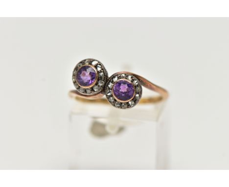 A 19TH CENTURY TOI ET MOI RING, two circular cut amethyst stones, set with a surround of rose cut diamonds in a white metal m