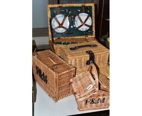 SIX WICKER BASKETS, comprising a small Fortnum and Masons hamper together with a small handled F&amp;M basket, a hinged wicke