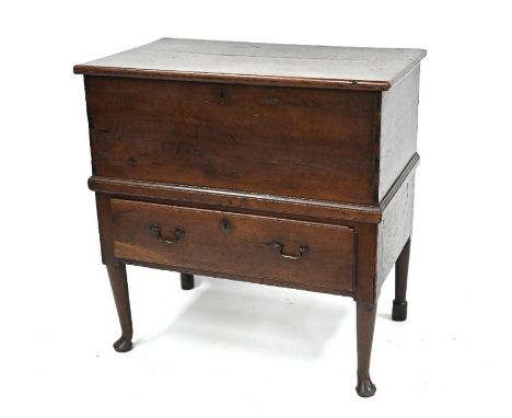 A late 17th/18th century oak trunk on stand, with drawer, raised on turned front legs on pad feet - back legs replaced 90 cm 