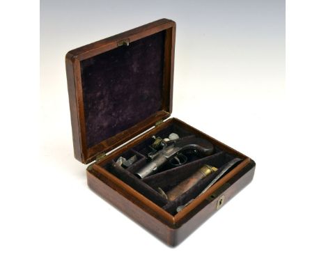 Boxed late 18th Century flintlock pocket pistol with turn-off barrel, box lock action, safety catch, rifled barrel, vacant es