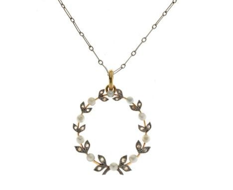 Edwardian rose diamond and seed pearl set pendant, of open oval wreath form, 2.5cm long excluding the bale, on a white metal 