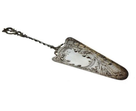 Late 19th Century Continental white metal fish/cake slice, with rococo style decoration and twist handle, French import marks