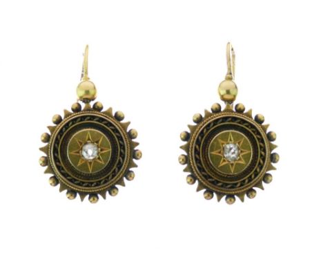 Pair of Victorian unmarked gold diamond set earrings, the circular panel set with a small old brilliant cut Condition: Very l