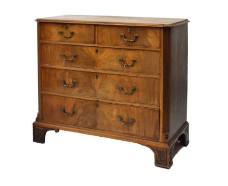 19th Century mahogany chest of drawers in the George III taste, the moulded canted oblong top over two short and three gradua