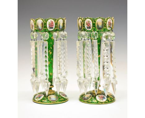 Pair of late 19th Century Bohemian overlay (white on green) glass table lustres, of typical castellated form with alternate p