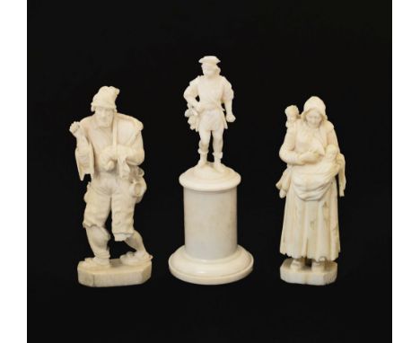 Three 19th Century Dieppe carved ivory figures, comprising a near pair, a mother breast feeding a child with another on her s