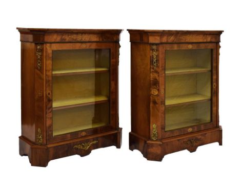 Pair of late Victorian inlaid walnut side or pier cabinets, each of canted breakfront form, the figured top over foliate scro