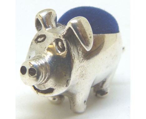 Silver pig pin cushion