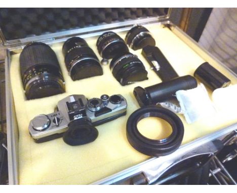 Olympus OM1 camera with lenses and motor drive in an aluminium box 