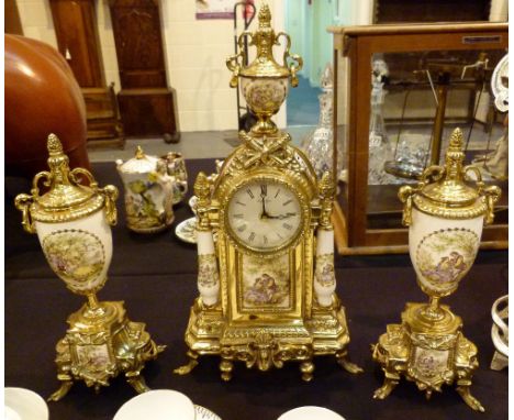Brass and enamel clock garniture in the Limoges fashion 