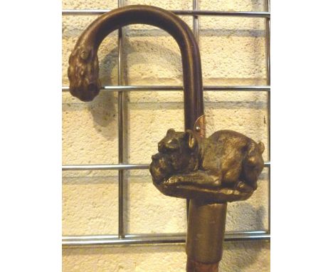 Silver collared walking stick and a bull mastiff example 