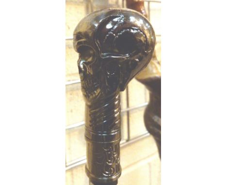 Skull handled walking stick 